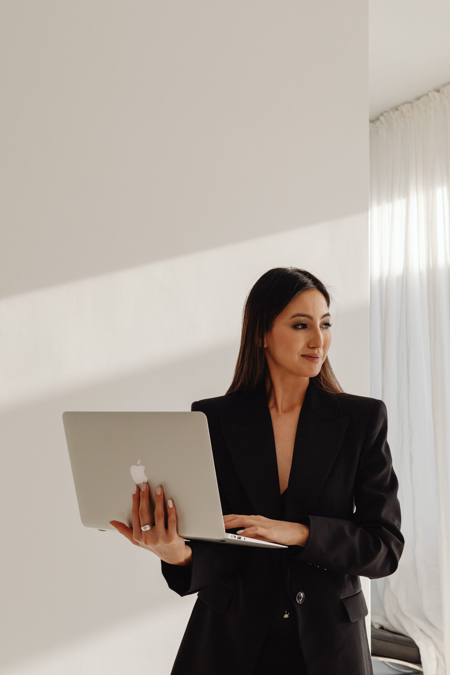 Woman holding computer