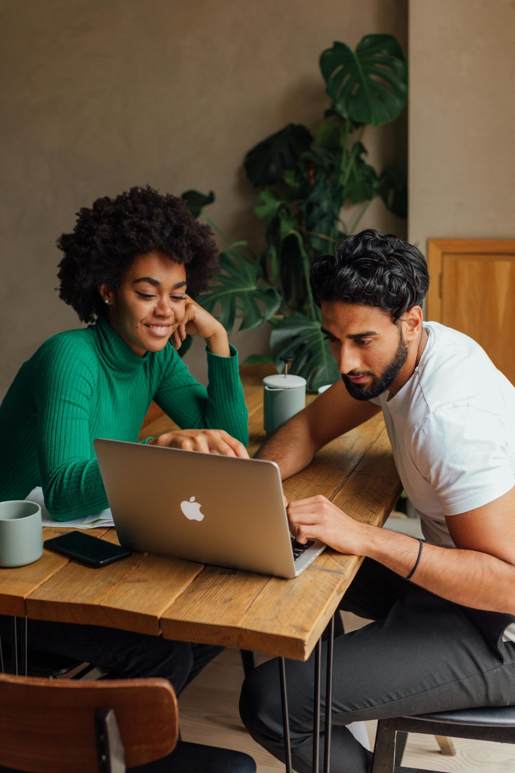 man and woman at computer